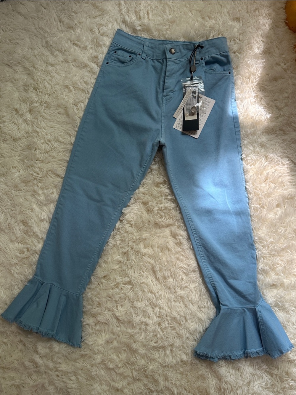 GUTTHA Ruffle-Hem Jeans in Light Blue